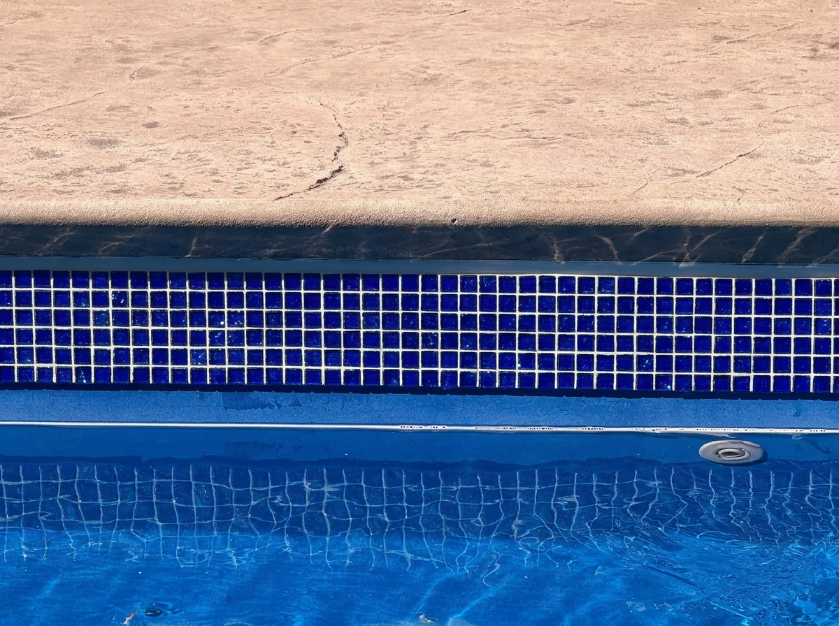 Deep blue mosaic waterline tile detail